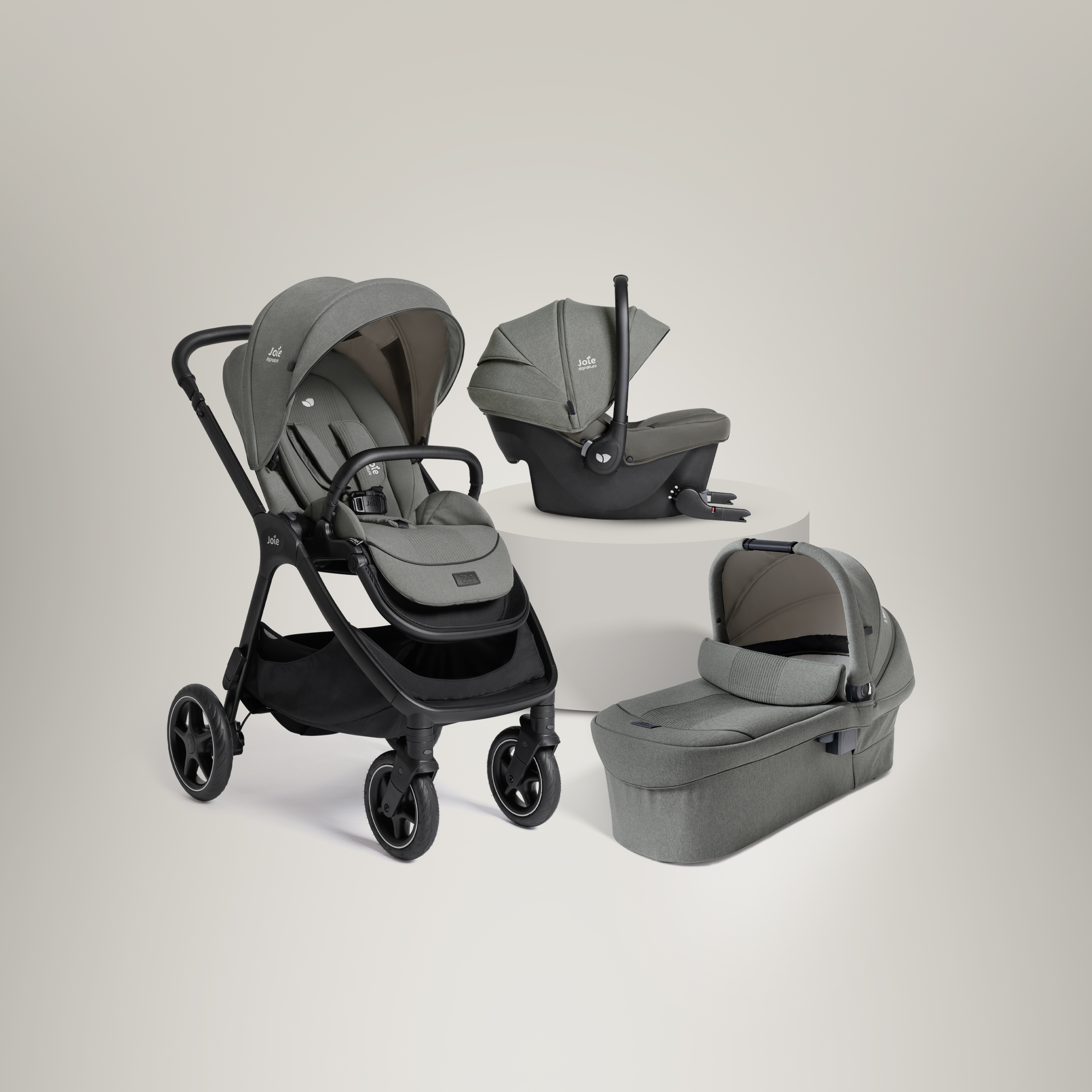 Joie Signature finiti pushchair, sprint infant car seat, and ramble xl carry cot displayed together, all in light green.