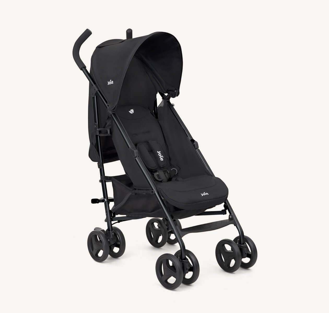Joie couri lightweight umbrella stroller in coal black displayed at a right angle.
