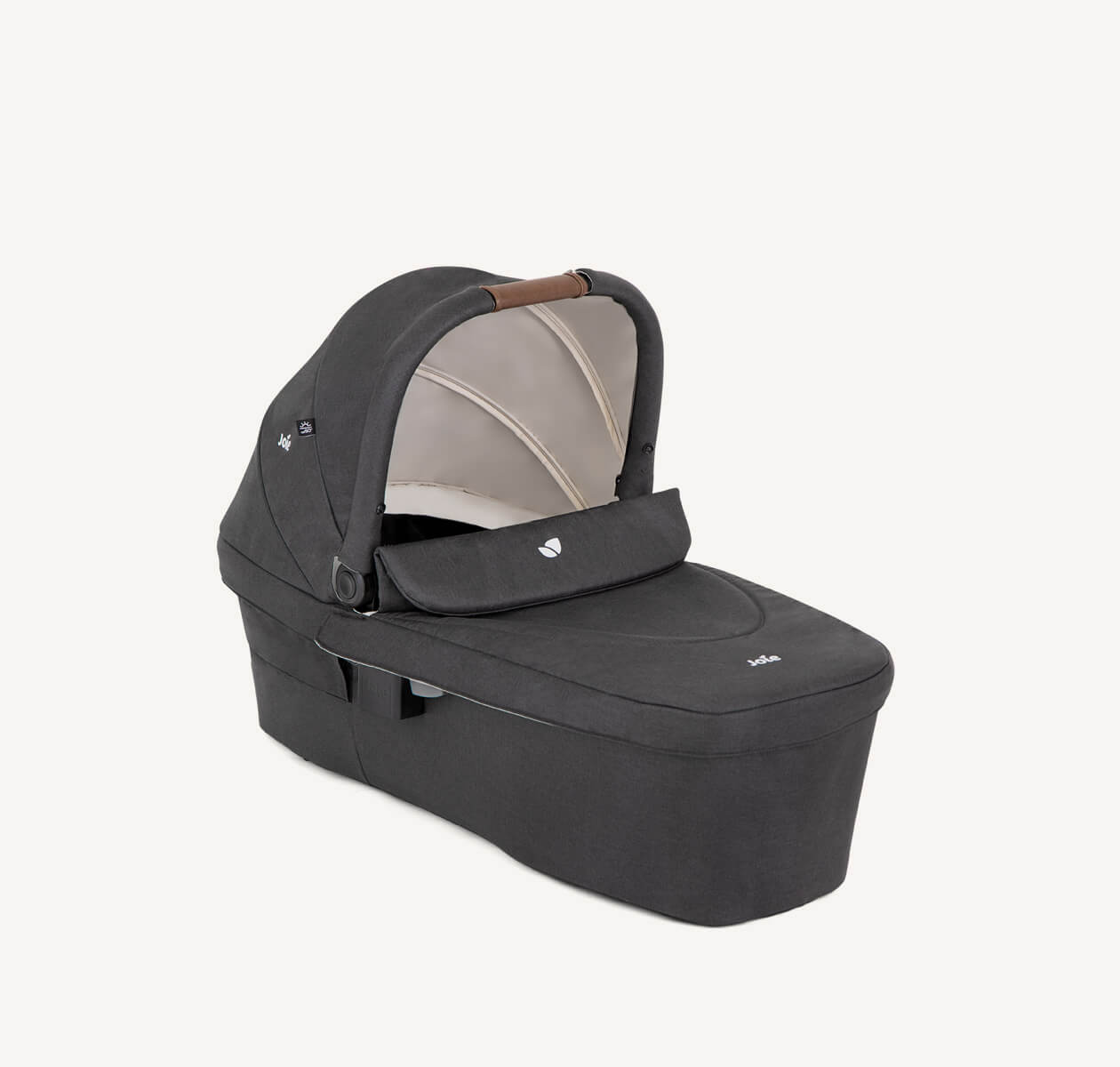 Joie Ramble xl carry cot in black on a right angle.