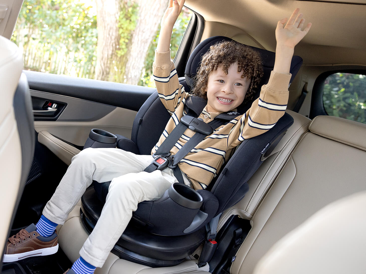 image of child in booster with back