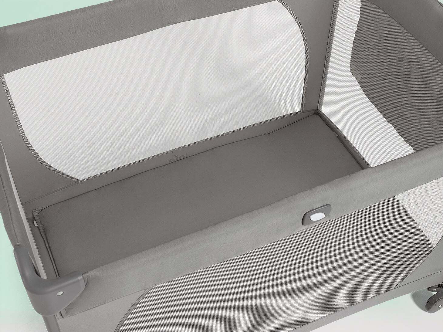 Overhead image of Pecan™ portable playard highlighting mattress
