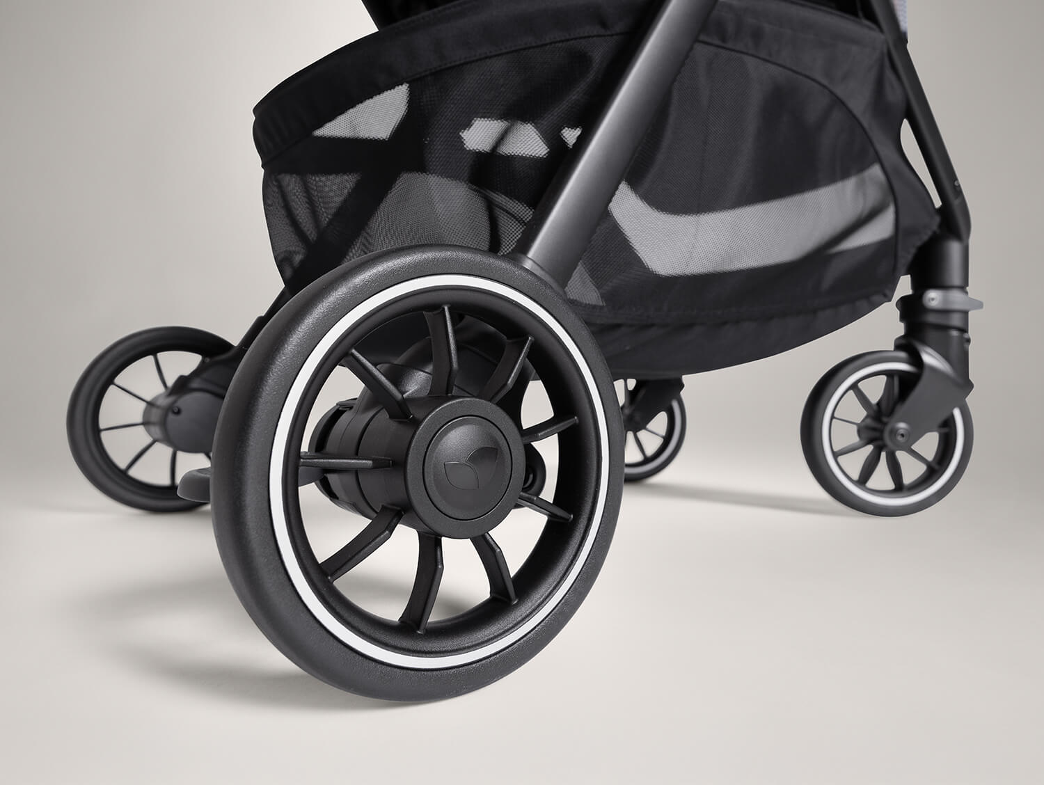 Rear wheel  of the parcel pop lightweight travel stroller.
