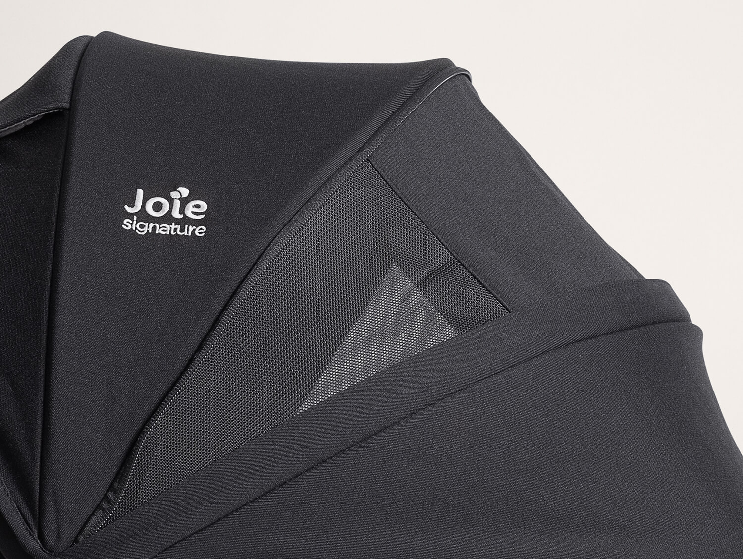 Large, expandable UPF 50+ and water resistant canopy shown fully exended with hidden mesh panels exposed for additional air flow.
