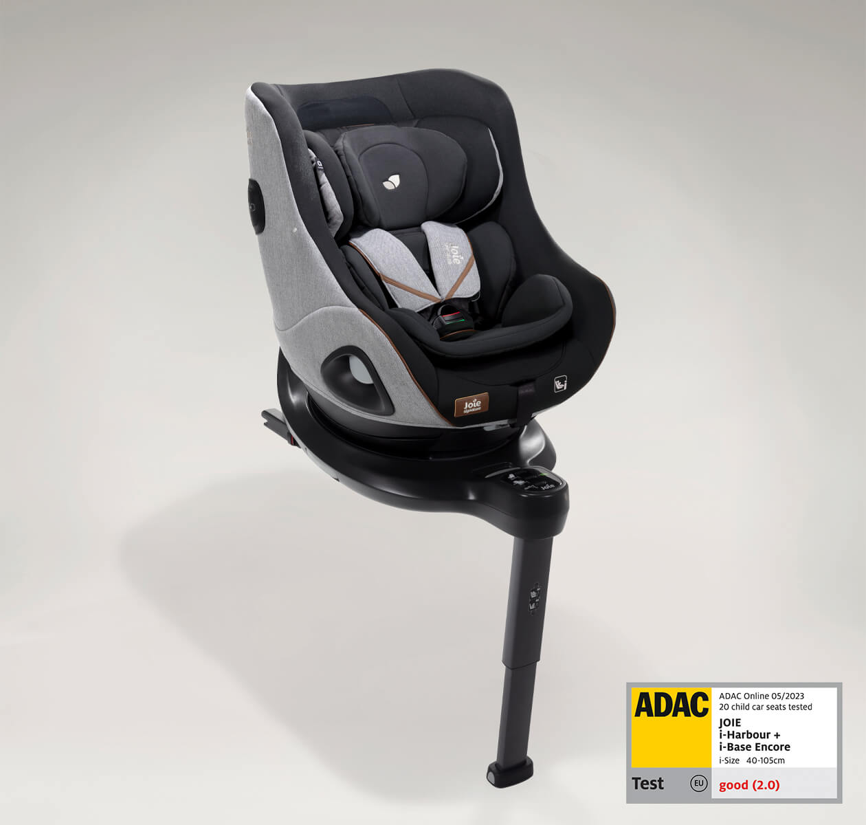 Light gray and black Joie i-Harbour car seat at an angle, with the ADAC test label in the lower right corner.