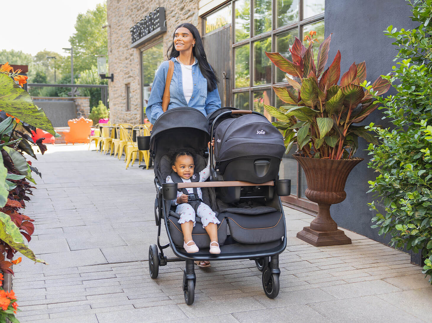 Mom walking with toddler in rosemary lx