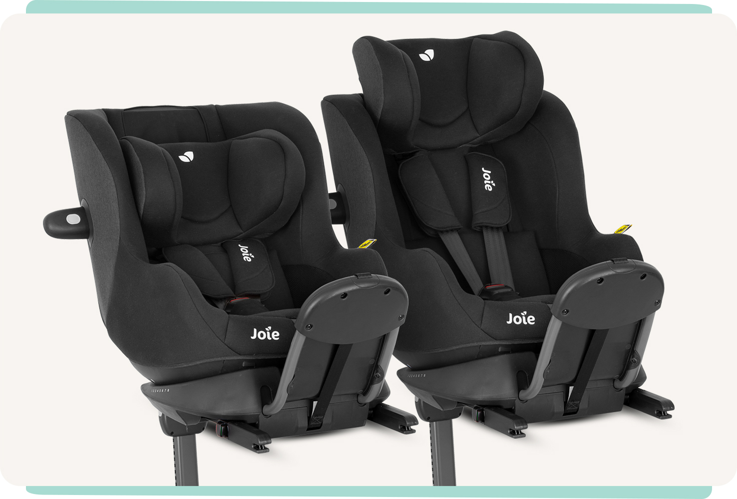 2 i-Soren 2 car seats side by side each other, with the one one the left having the headrest lower, and the one on the right with headrest raised. 
