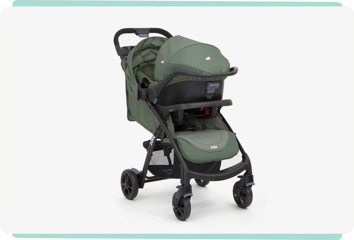   Light green Joie muze lx stroller at a right angle with infant carrier.