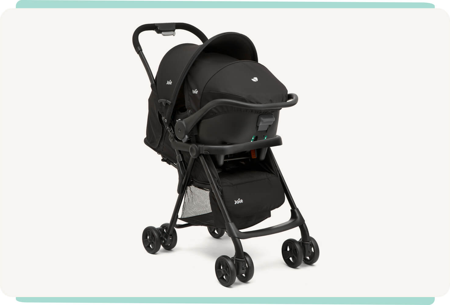  Joie i-Juva travel system pushchair in black at a right angle with infant carrier attached.