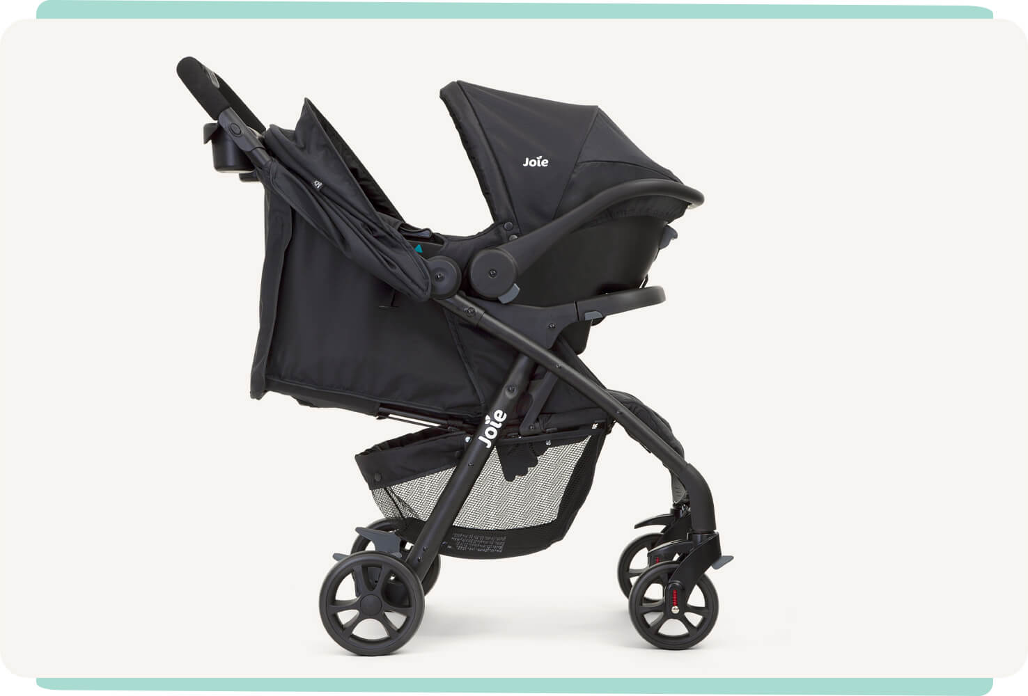  Side profile of Joie black muze lx travel system with infant carrier.

