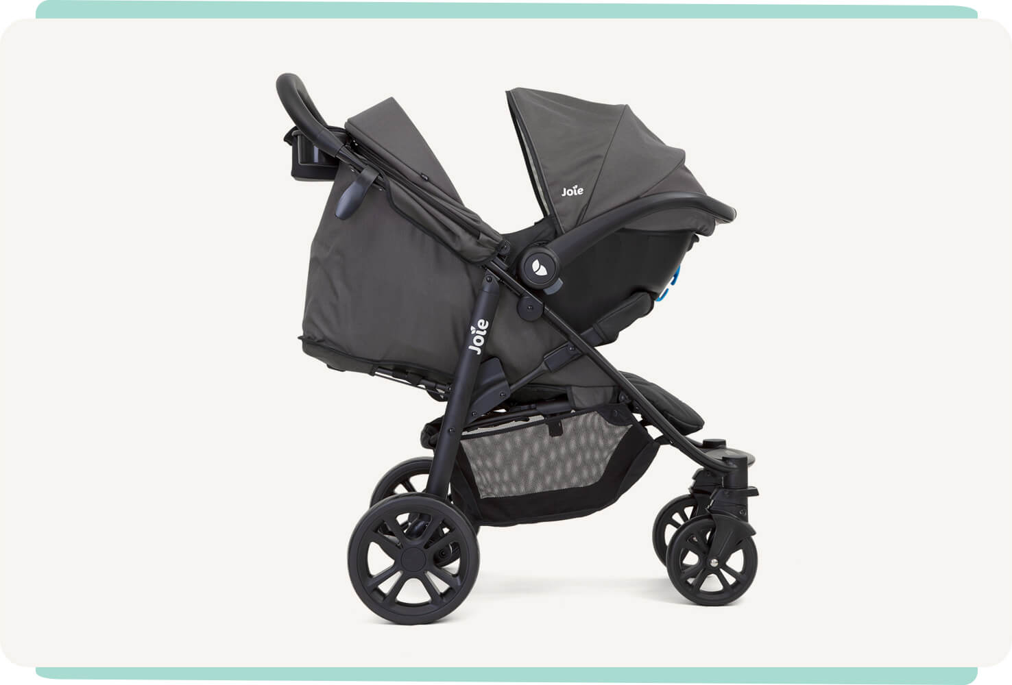 A black Joie Litetrax 4 travel system with the infant car seat attached to the stroller, facing toward the right in profile.