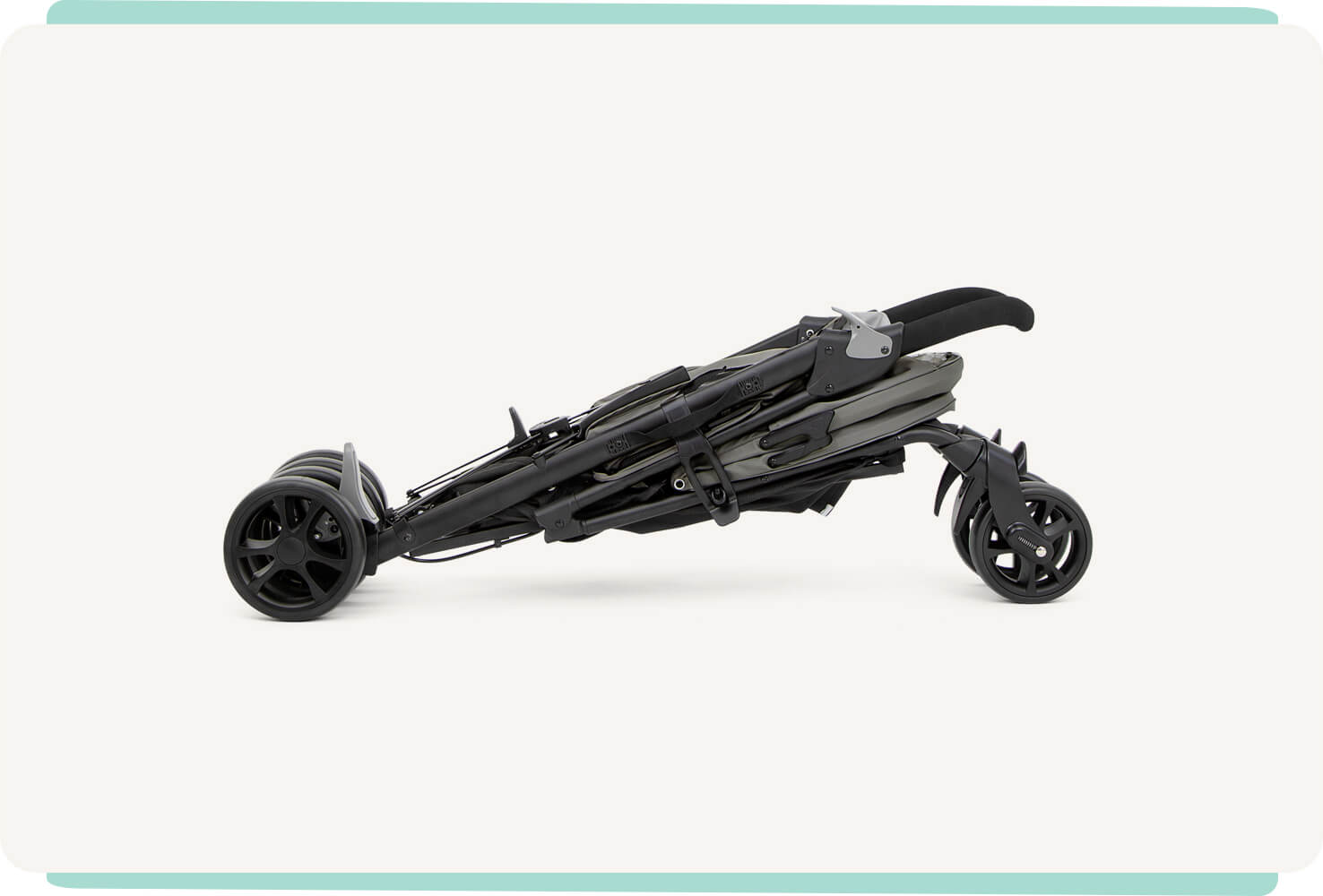   A folded Joie Brisk LX stroller in gray.