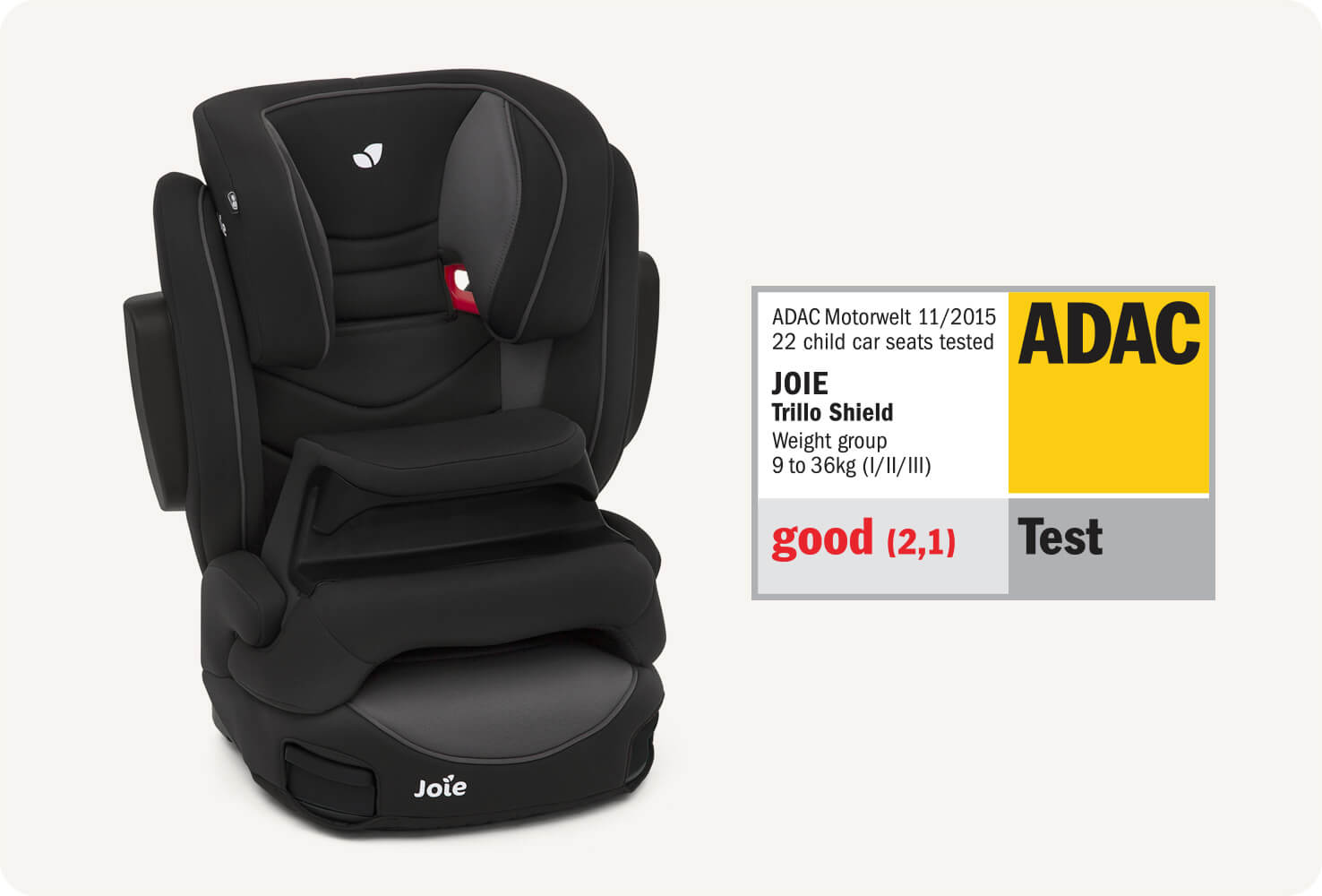  Joie trillo shield booster car seat in black positioned at a right angle. To the right of the carseat, an ADAC award is displayed explaining the merit this seat has achieved.