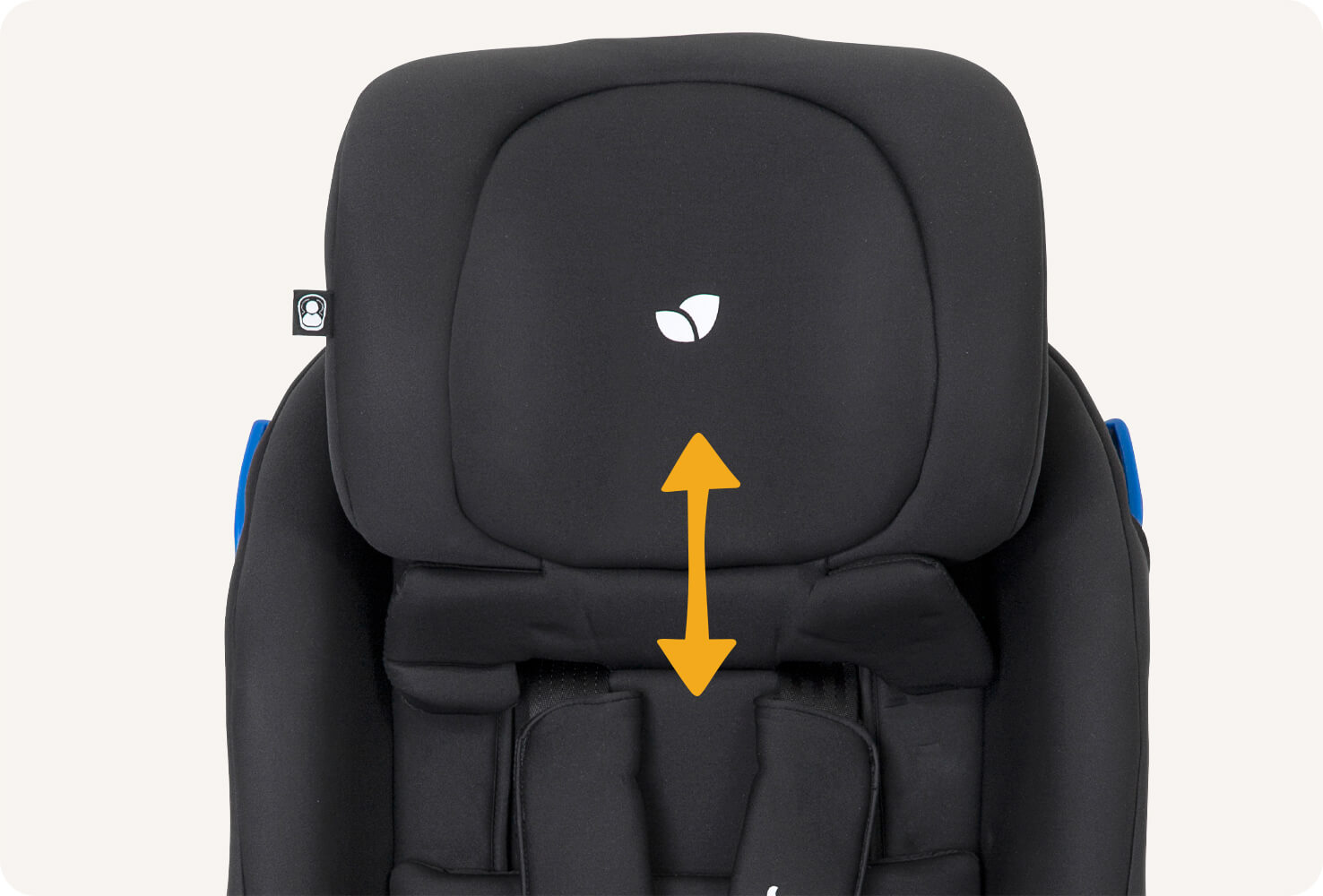 Joie Steadi car seat with harness clipped in and head rest set at highest position with yellow arrow pointing up and down on headrest that has a black colour, and facing forward.