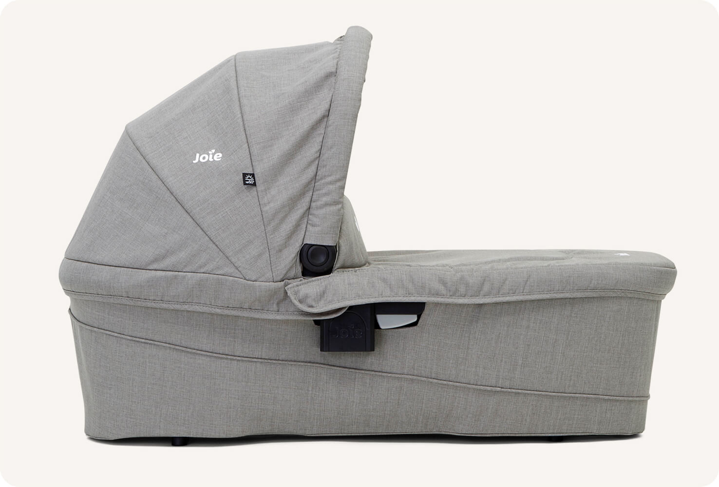  Joie Ramble xl carry cot in light gray on side angle. 