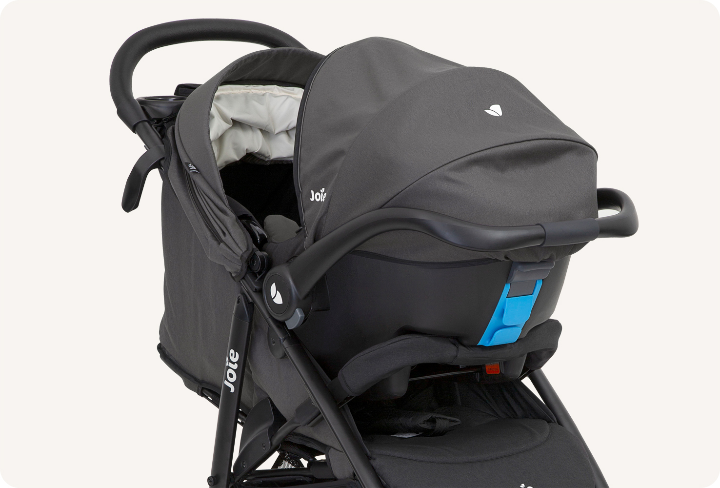  Joie litetrax 4 travel system in black with gemm infant carrier at an angle.