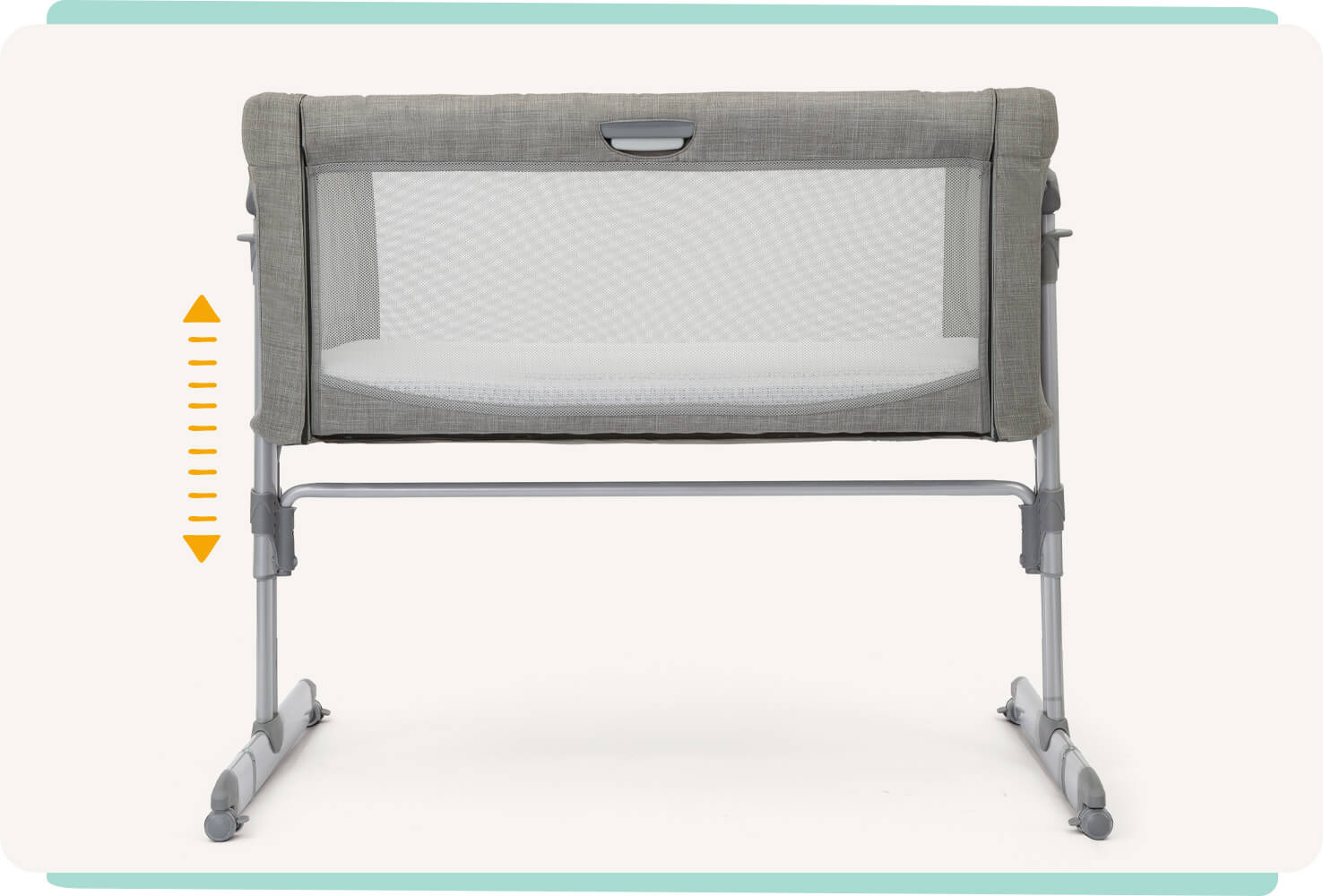  Zoomed in on side profile of light grey Joie roomie glide bedside crib. Two orange arrows display the gliding motions of the bedside crib.