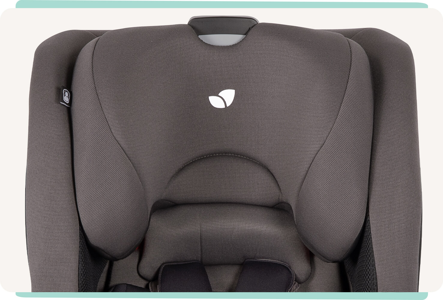 Close-up of the headrest on a dark gray Joie bold R toddler car seat.