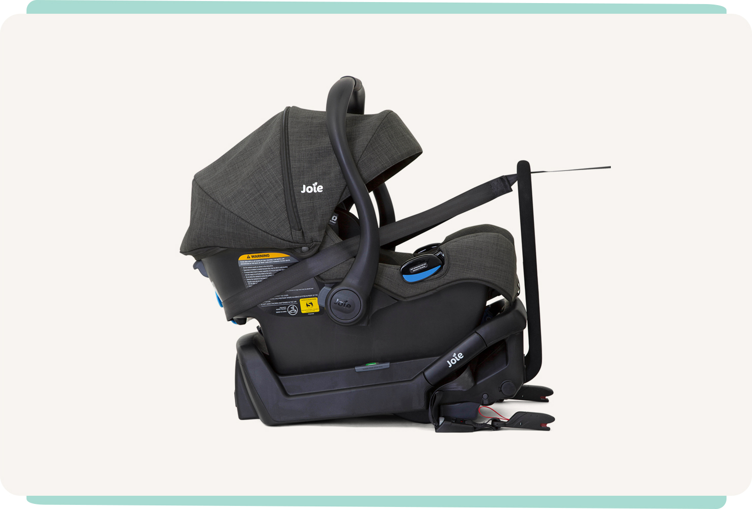 Black Joie I-Gemm infant car seat in profile on an angle facing to the right, attached to the I-Gemm base in black.