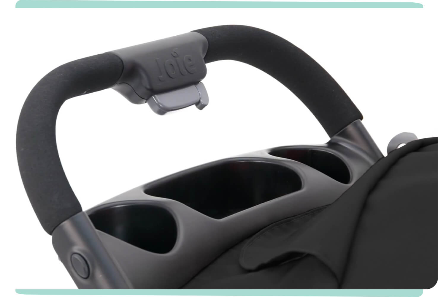   Zoomed in view of handle bar on Joie muze lx stroller.

