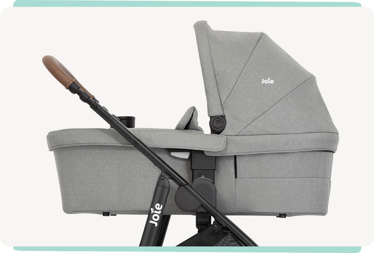 Image of the joie versatrax pram with grey ramble XL attached facing to the left
