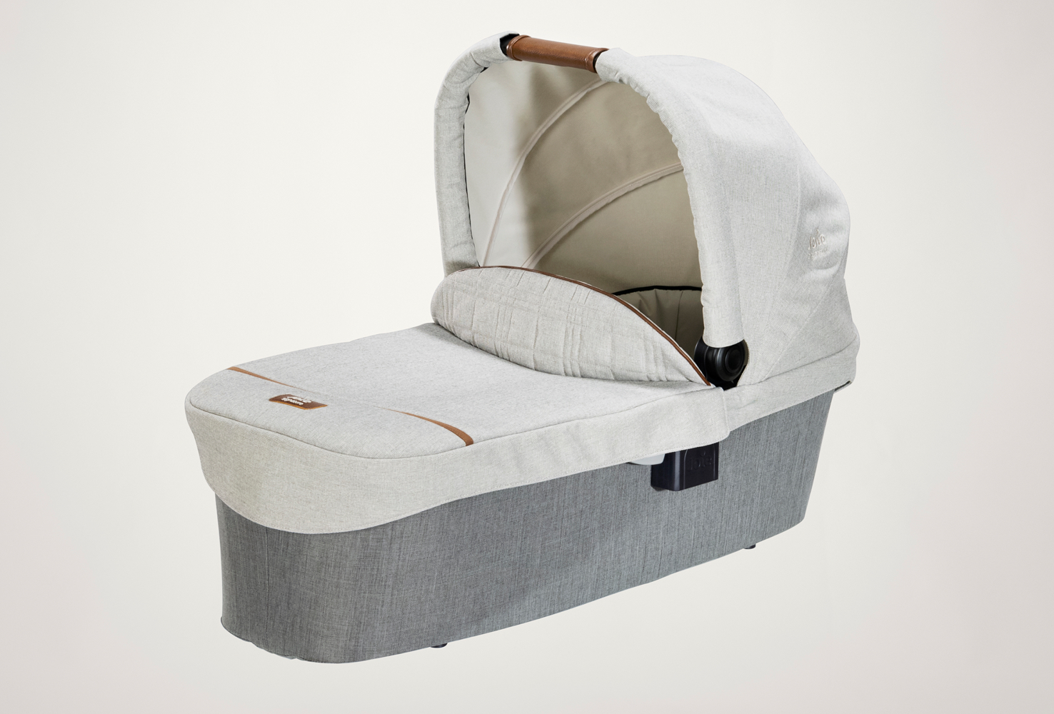 Gray Joie Signature Ramble carry cot facing toward the left at an angle. 