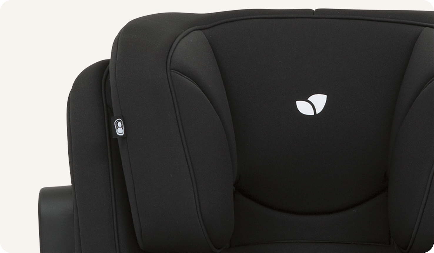  Joie traver booster seat in black with a close up of the headrest cushion. 
