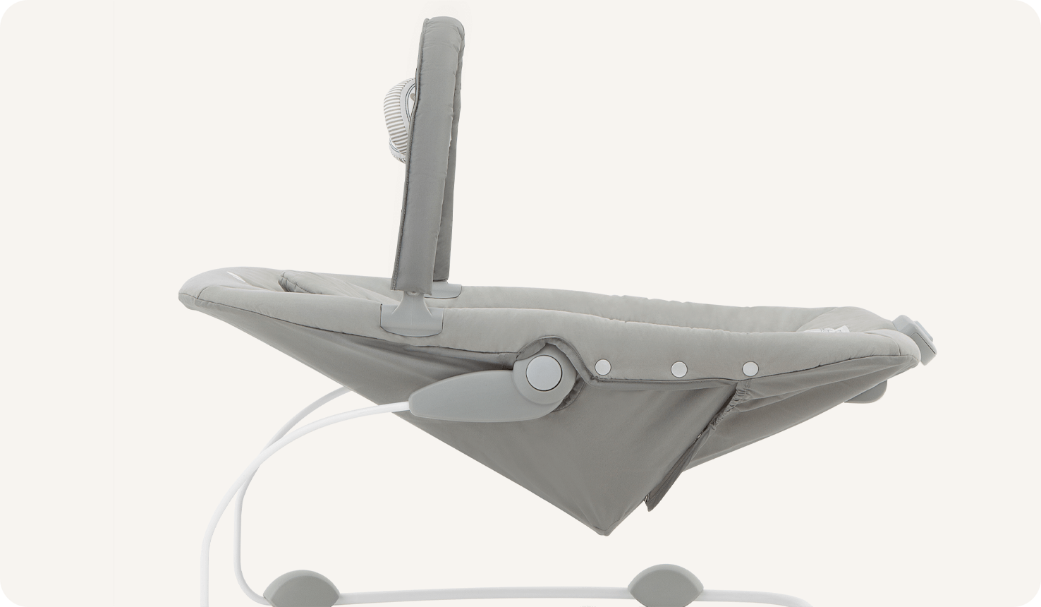   Side view of Joie light gray wish bouncer, reclined.