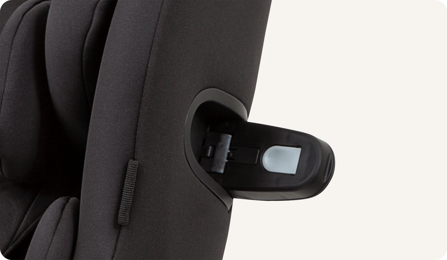  Closeup of side impact protection wing on a black Joie I-Spin 360 car seat.