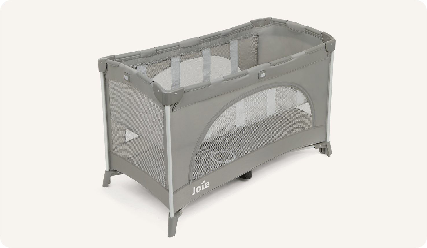 The Joie travel cot allura in grey, pink, and flower patterns on a right angle.