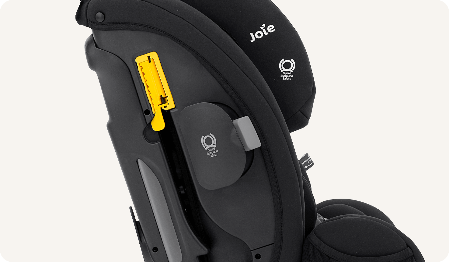 Joie armour fx car seat in black from the right profile view with headrest fully lowered zoomed in on the yellow seatbelt path.