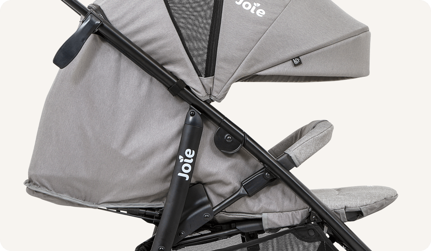 Closeup of a gray litetrax 4 dlx stroller showing the flat recline.