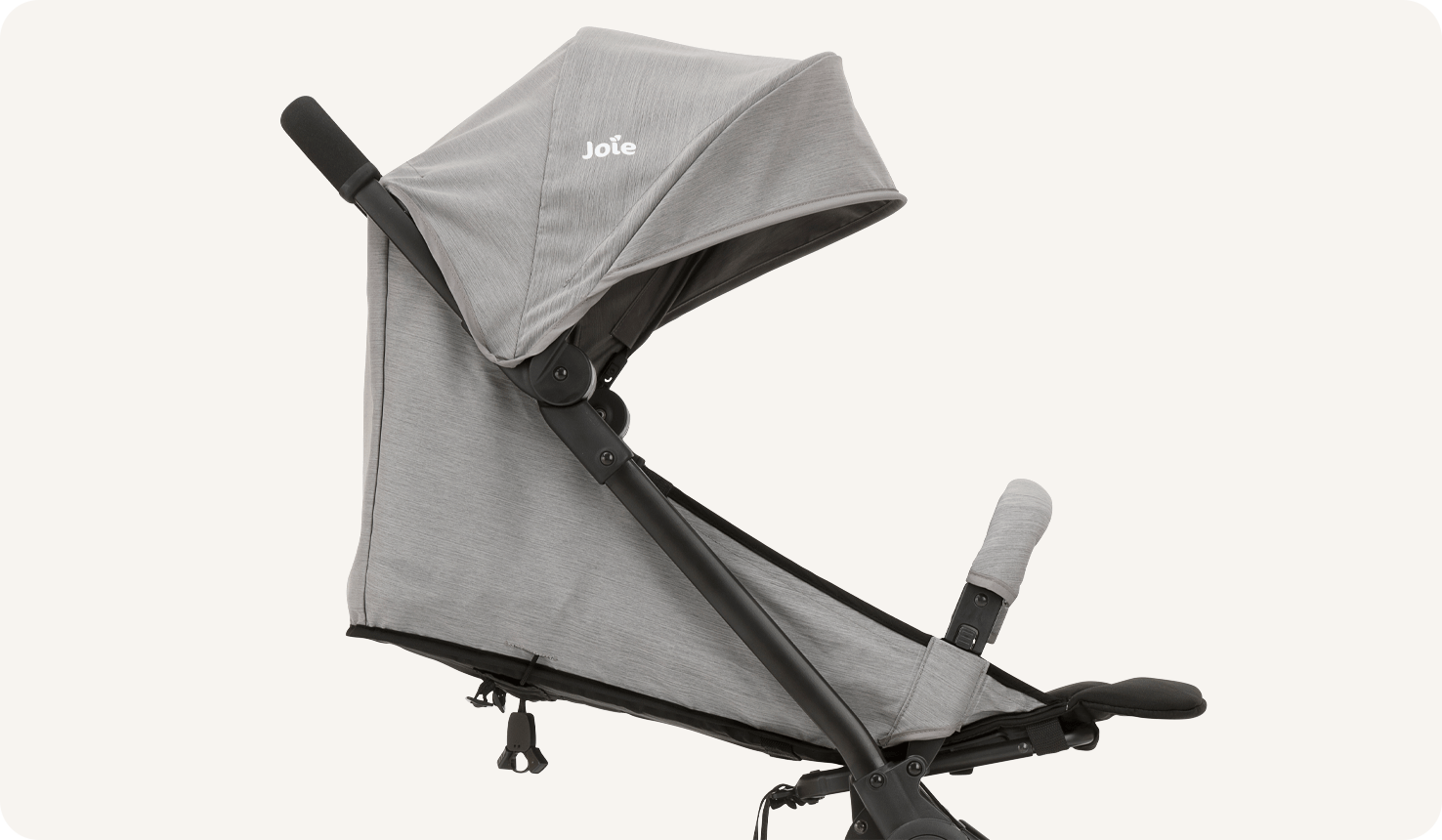  Joie Pact Lite in black and grey with seat back on lowest setting on a side angle. 