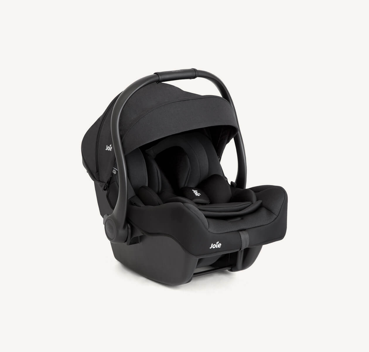 Joie trove infant capsule in black at a right angle 