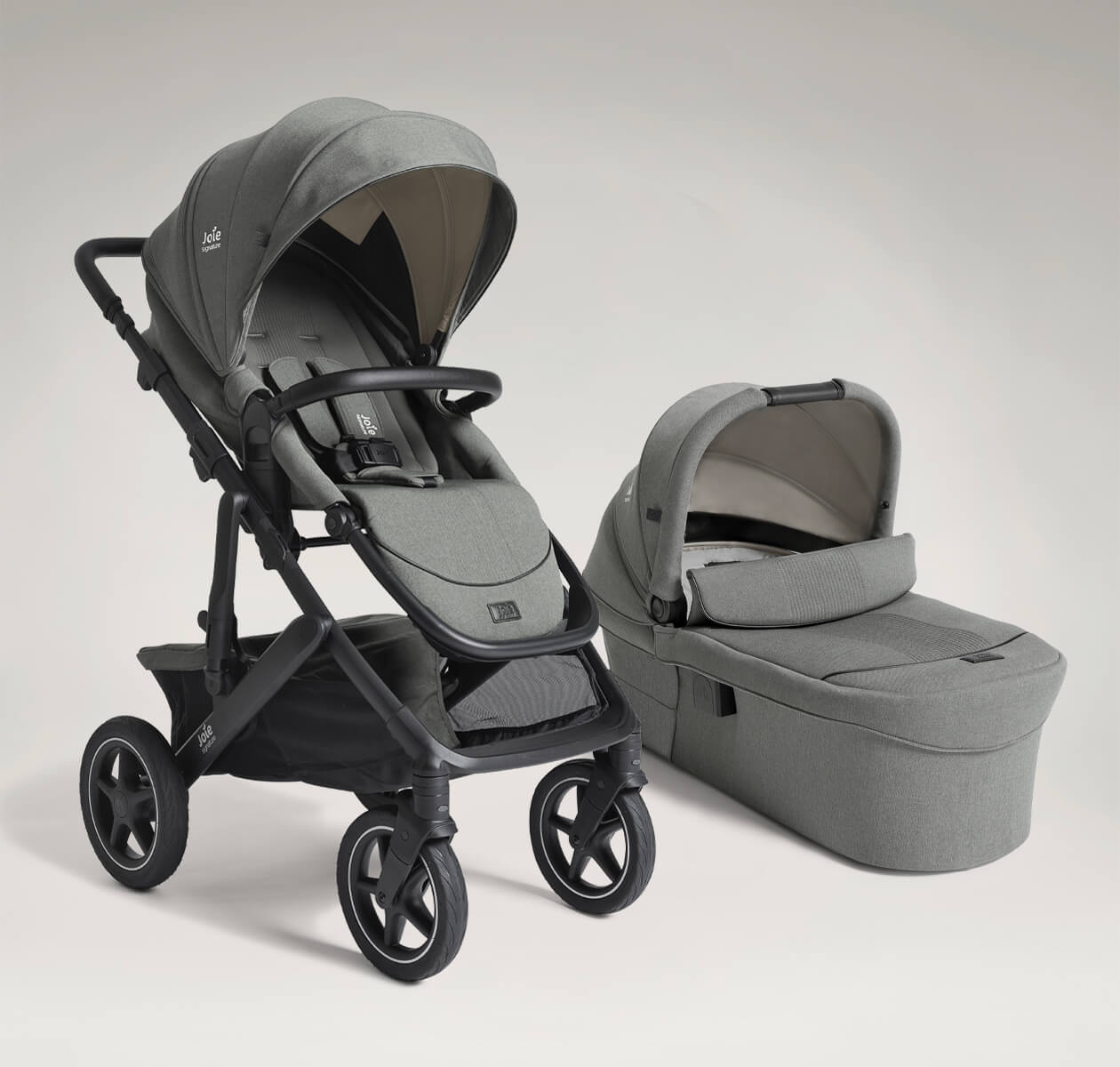 Joie vinca pushchair and ramble xl carry cot in light green at a right angle.
