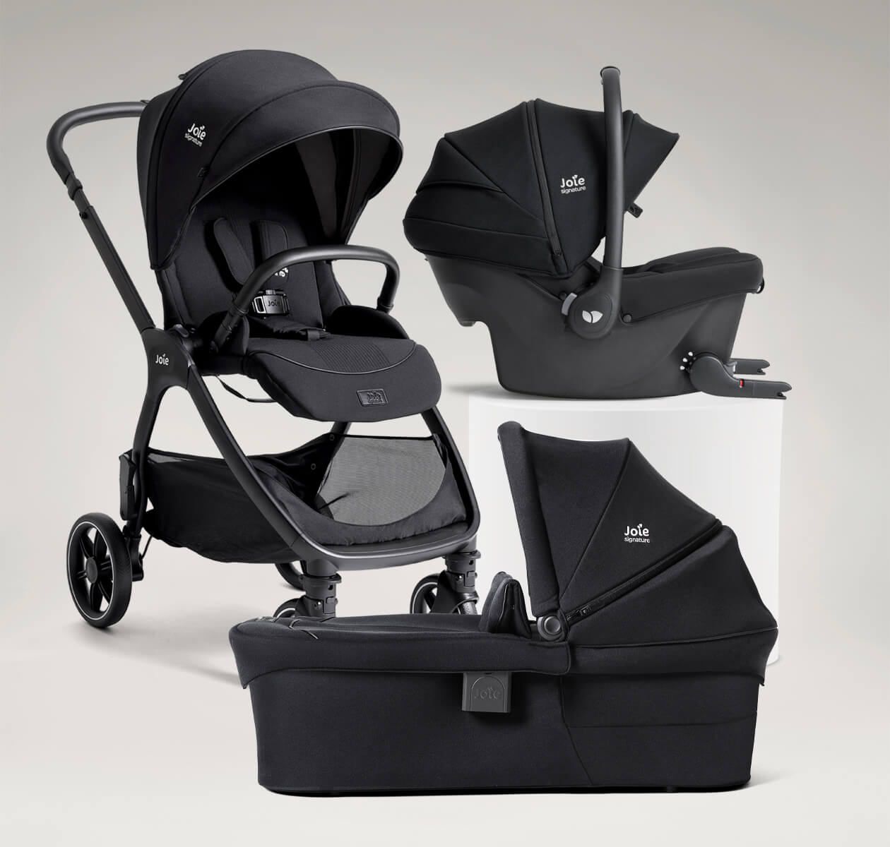 Joie Signature valora click and go bundle including valora pushchair, sprint infant car seat with built in ISOFIX, and ramble xl carry cot all in black.
