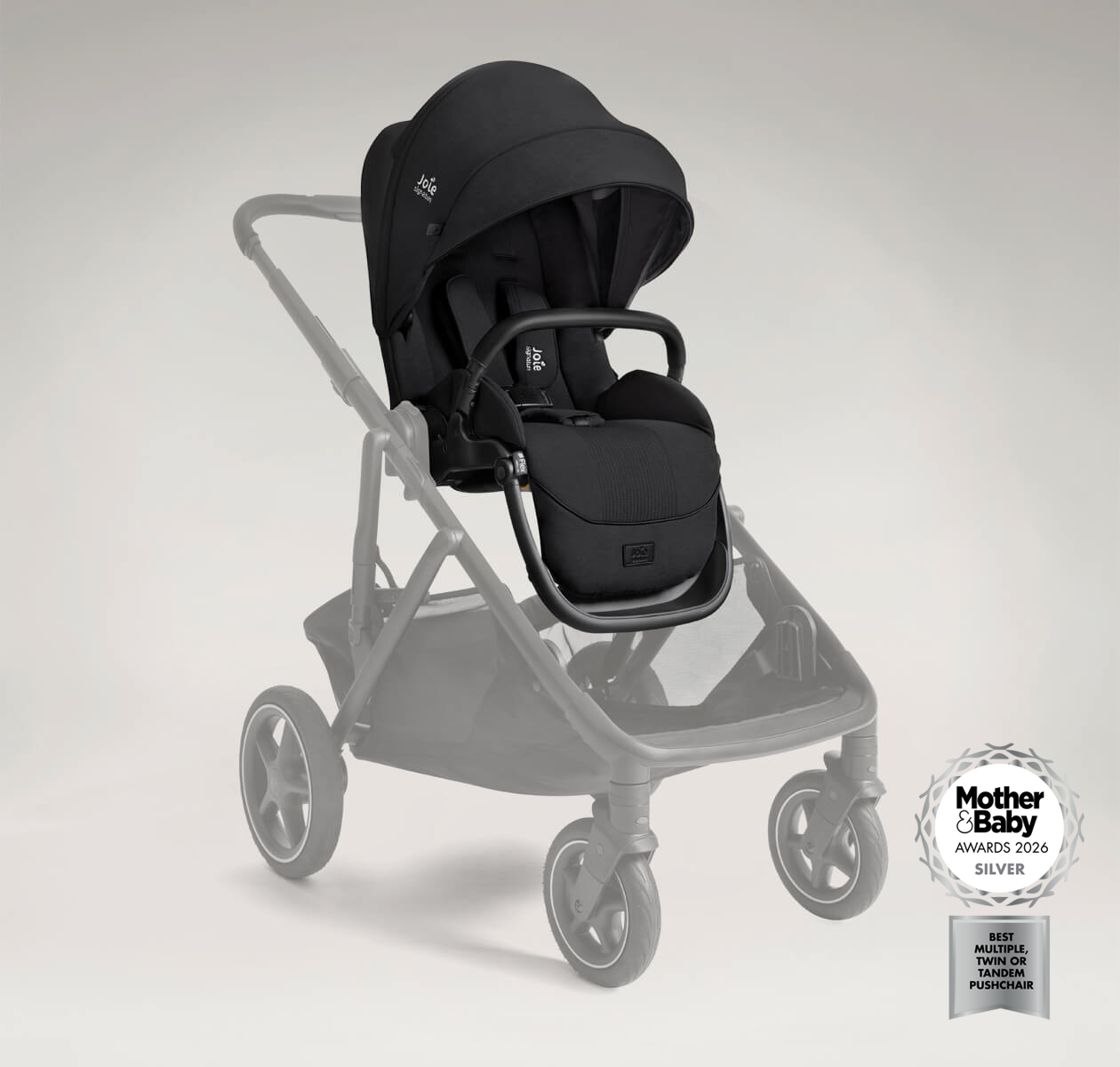 Joie Versiti Sibling Seat in black on Versiti pushchair frame, seat highlighted positioned at an angle. The image also features a logo indicating that the product is a 2026 mother and baby awards silver winner for best multiple, twin or tandem pushchair.