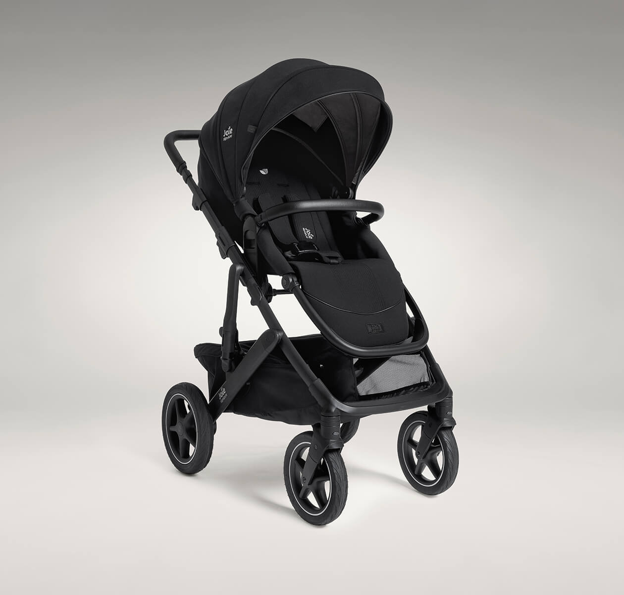 Joie vinca pushchair in black at a right angle.
