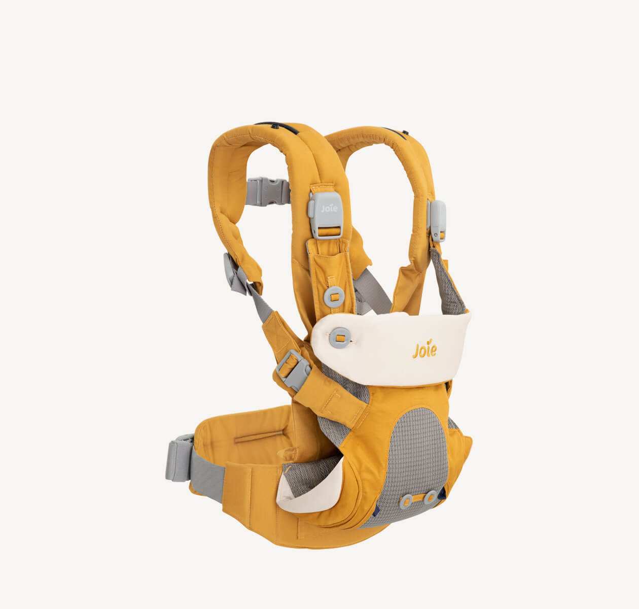 A mustard yellow Joie Savvy 4in1 baby carrier at an angle facing right