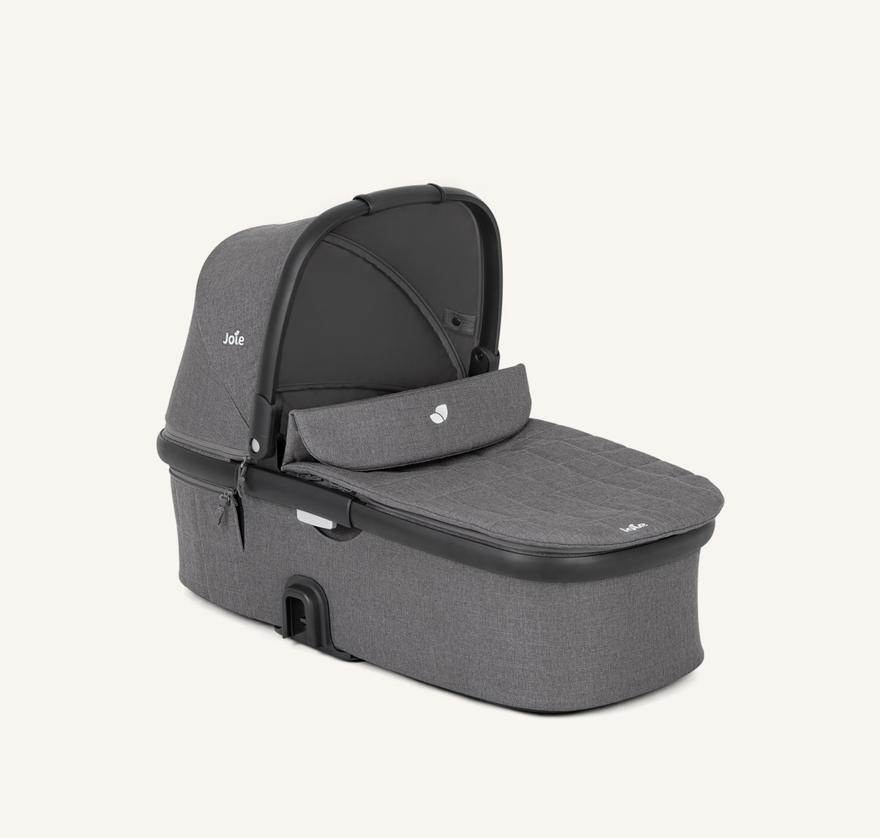Joie honour carry cot in gray facing to the right 
