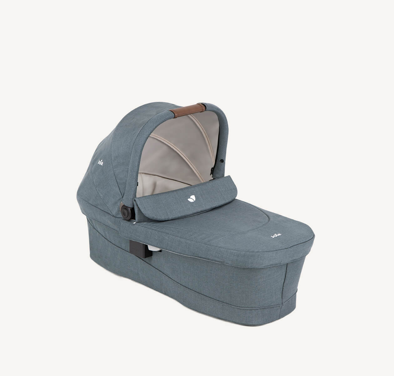 Joie Ramble xl carry cot in black on a right angle.