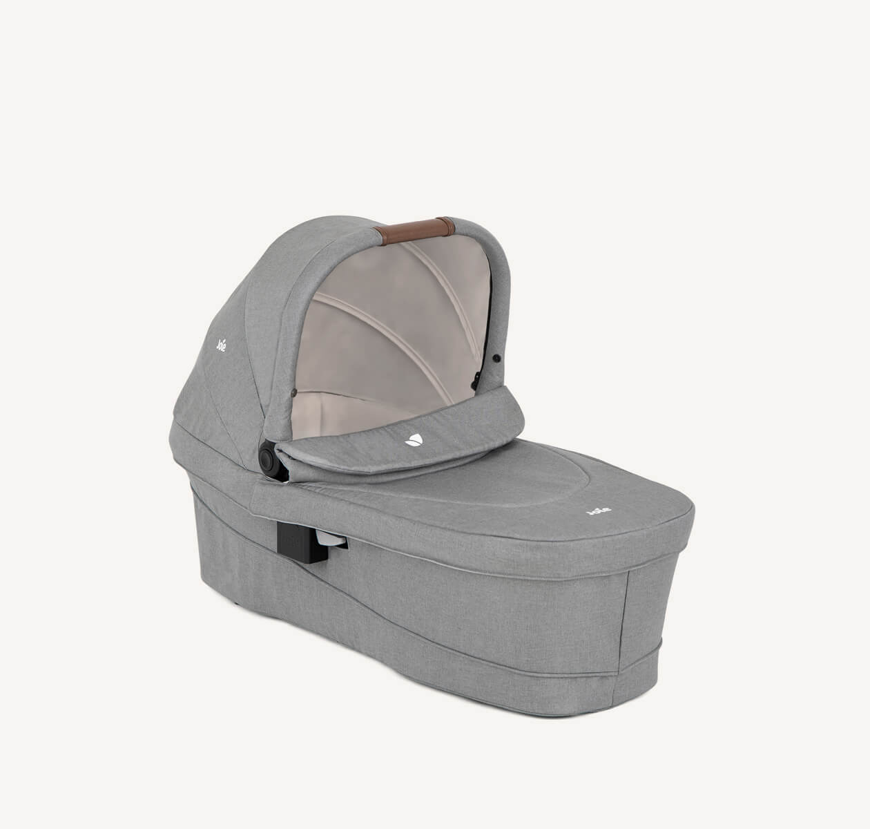 Joie Signature ramble xl carry cot in gray at a right angle with hood raised.
