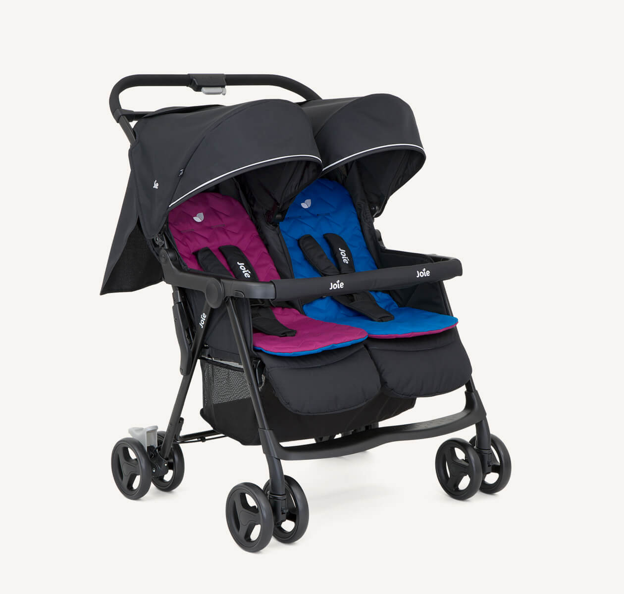  The Joie Aire Twin side-by-side double stroller in black at an angle, with a pink insert on the left seat and a blue insert on the right seat.