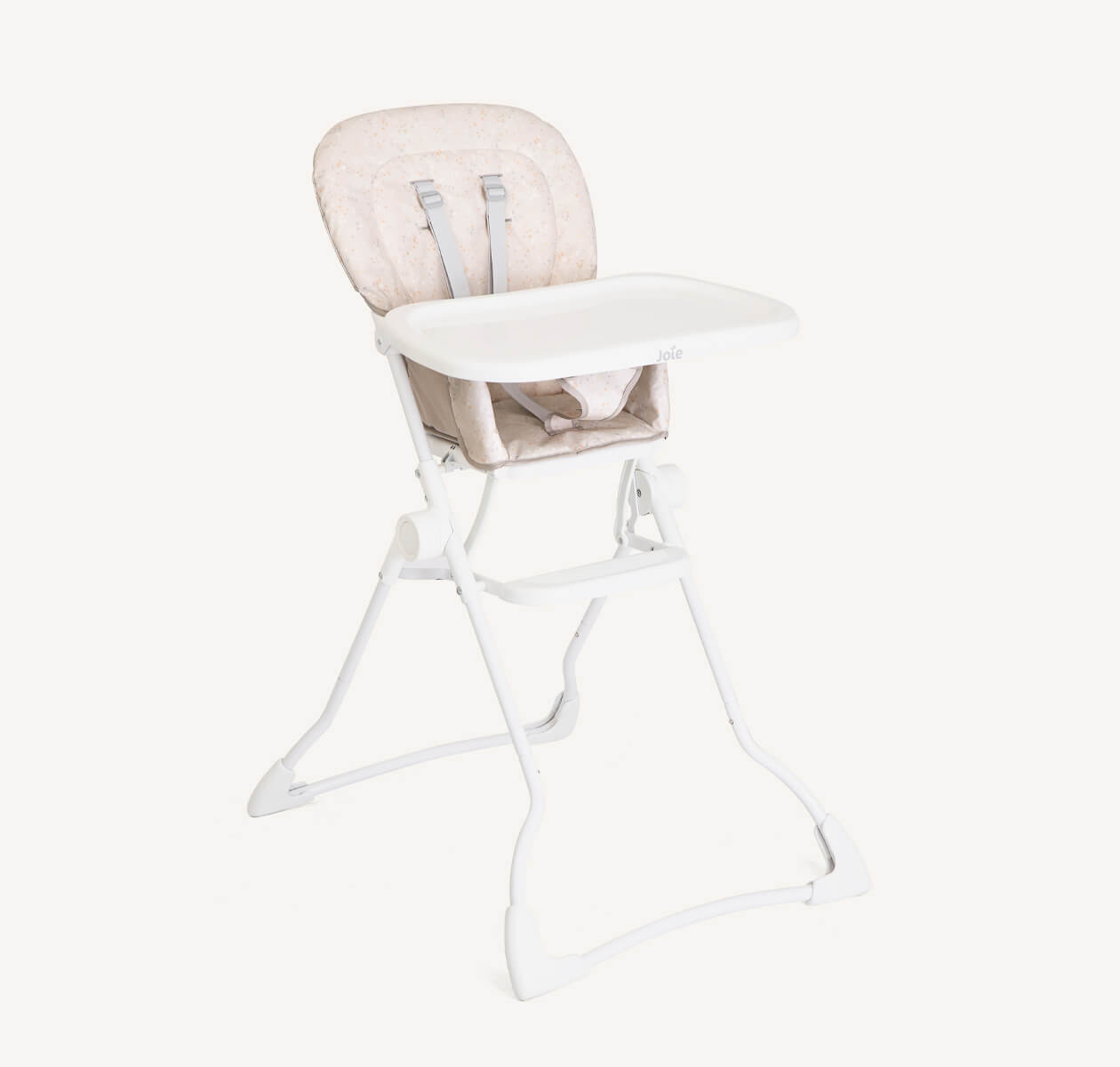 Joie mimzy micro highchair in multi-color fashion at a right angle