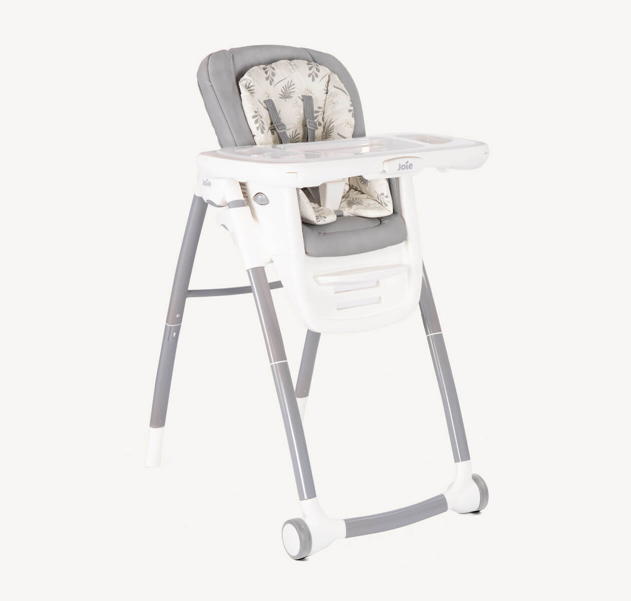 A multiply highchair with light grey and starts patterns seat, white tray with grey front wheels on a right angle.