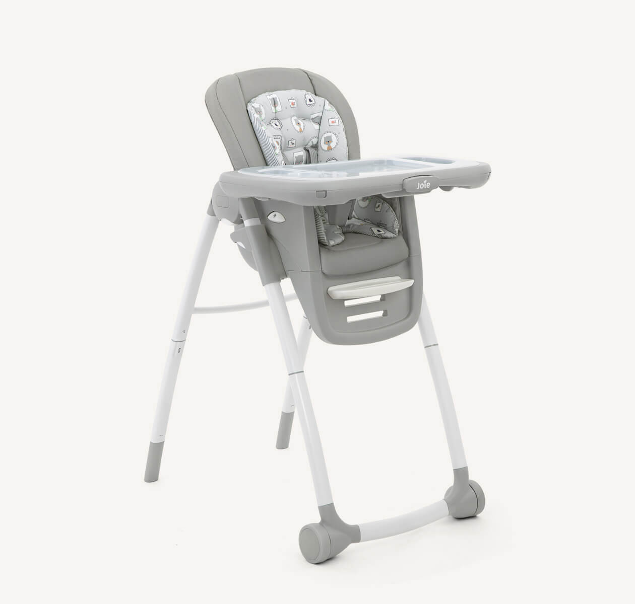 A multiply highchair with light grey with city patterns seat, grey tray with grey front wheels on a right angle.
