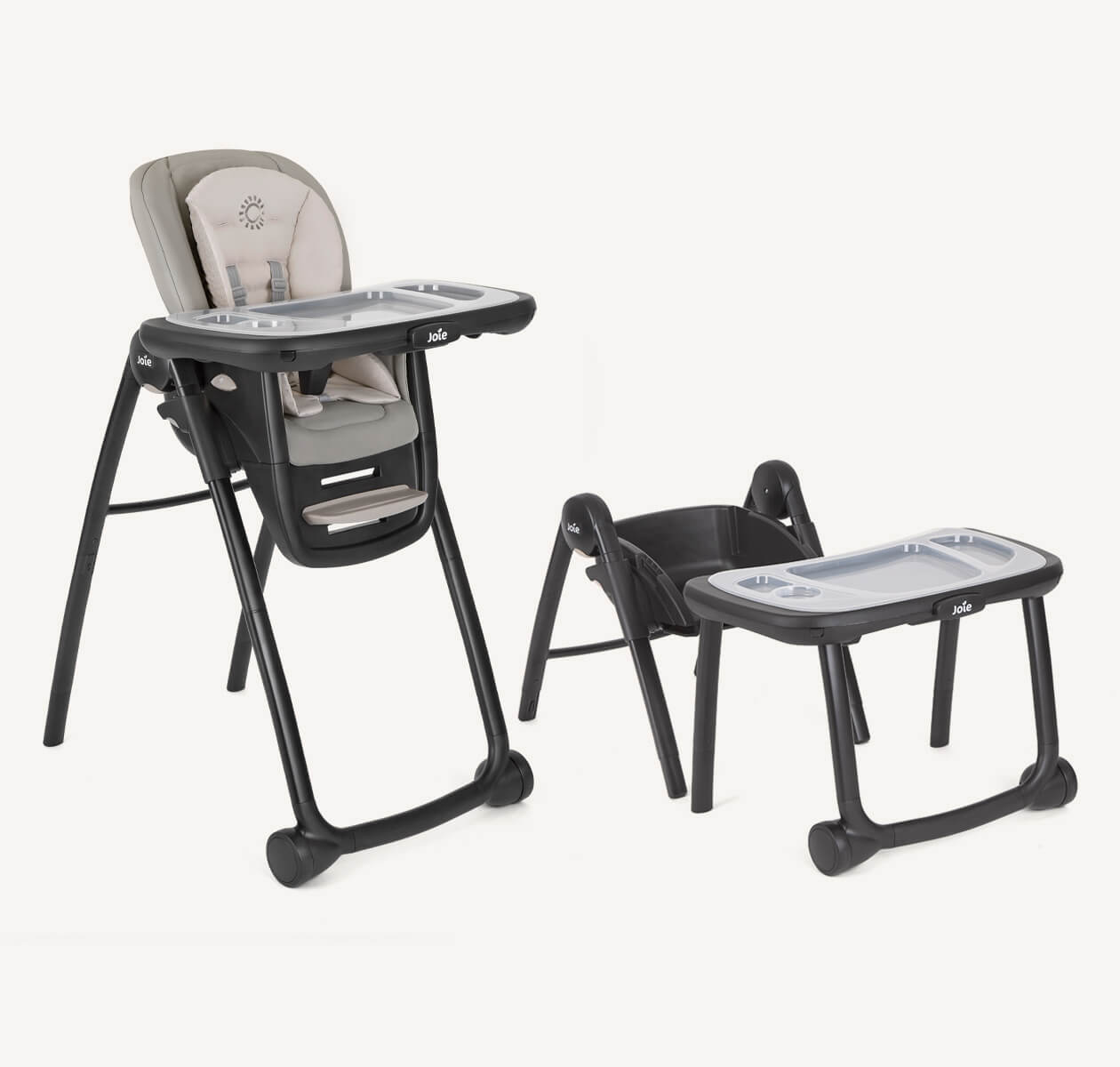 A multiply highchair with light grey and starts patterns seat, white tray with grey front wheels on a right angle.