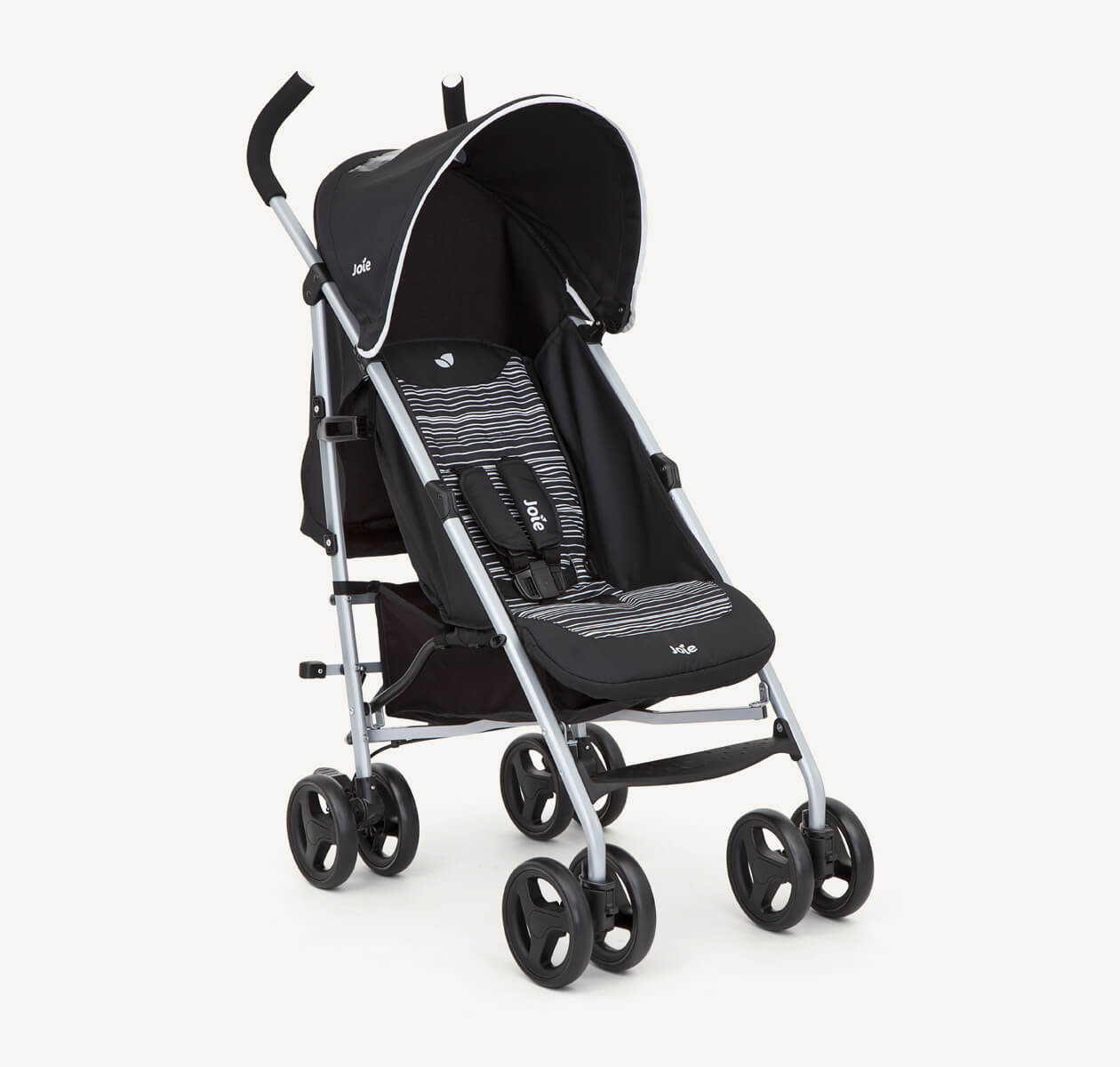 Joie black and white rapid stroller positioned at a right angle.