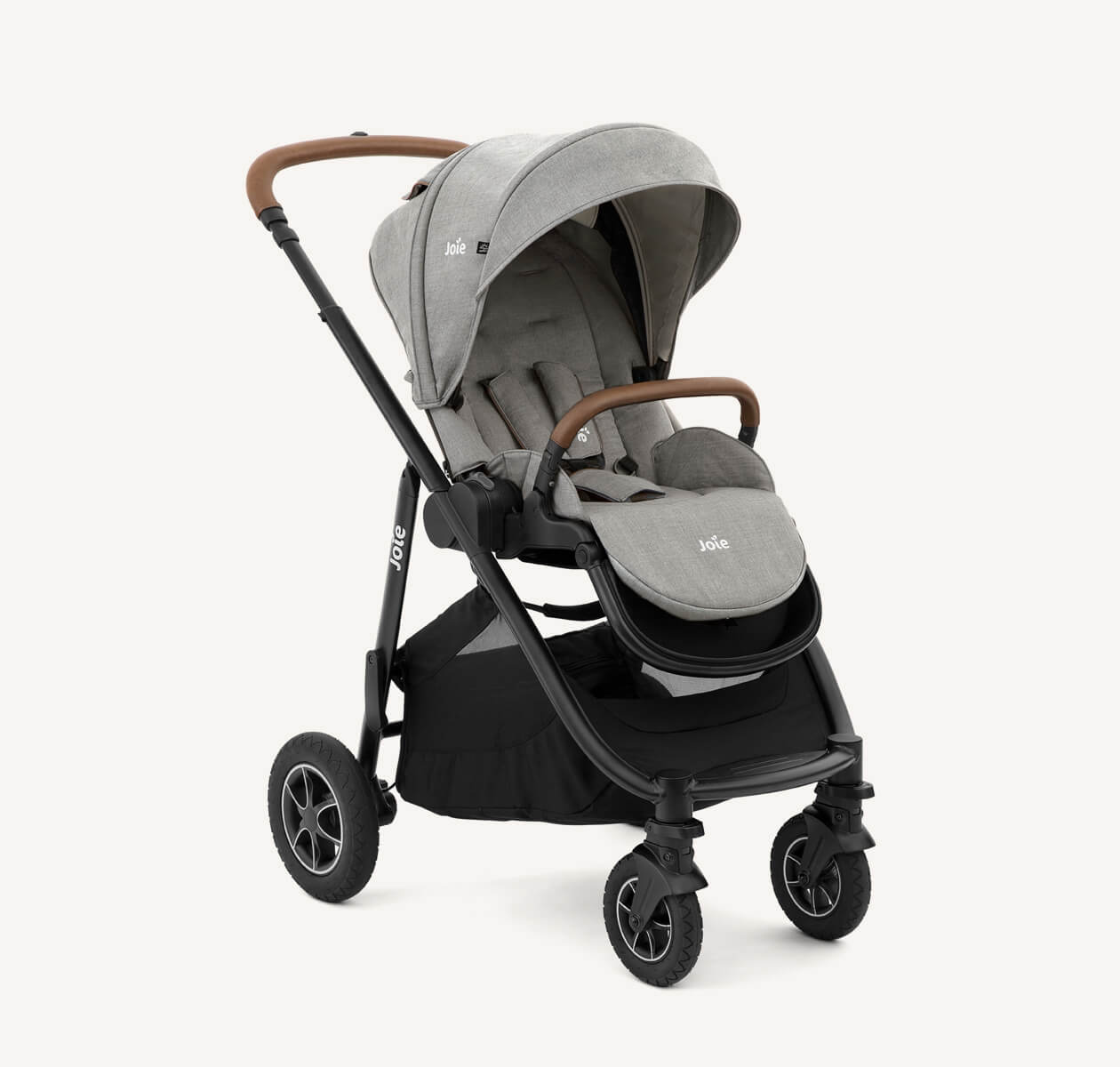 Joie light green versatrax pram positioned at a right angle.

