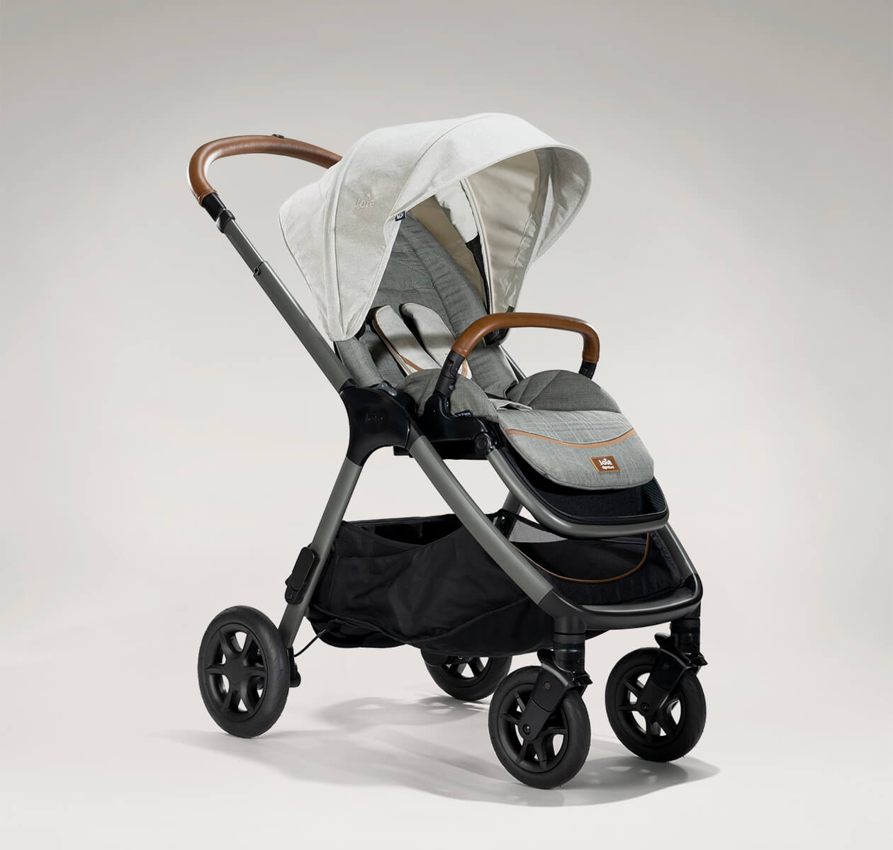 Joie finiti pram in light gray at an angle.