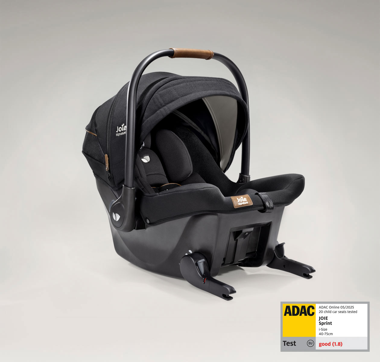 Joie signature's ISOFIX integrated infant carrier in black at an angle ISOFIX lowered 